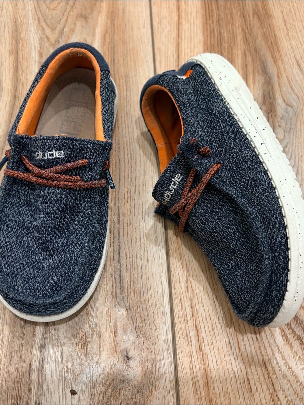 Hey Dude Kids Slip-On Sneakers in Navy with Orange Lining and Brown Laces